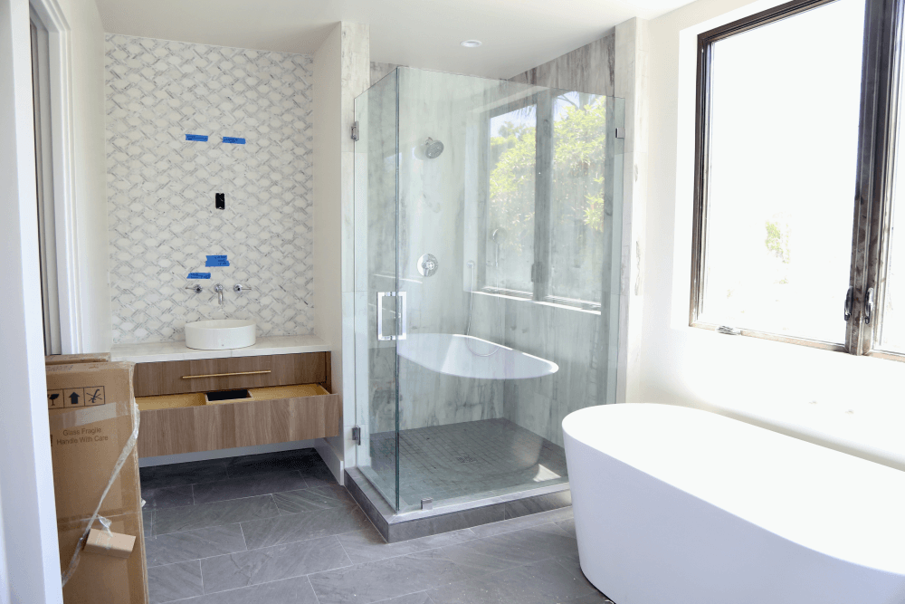 New frameless shower door installation with bathroom renovation